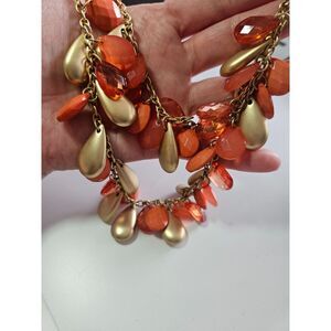 Gold tone coral statement necklace
